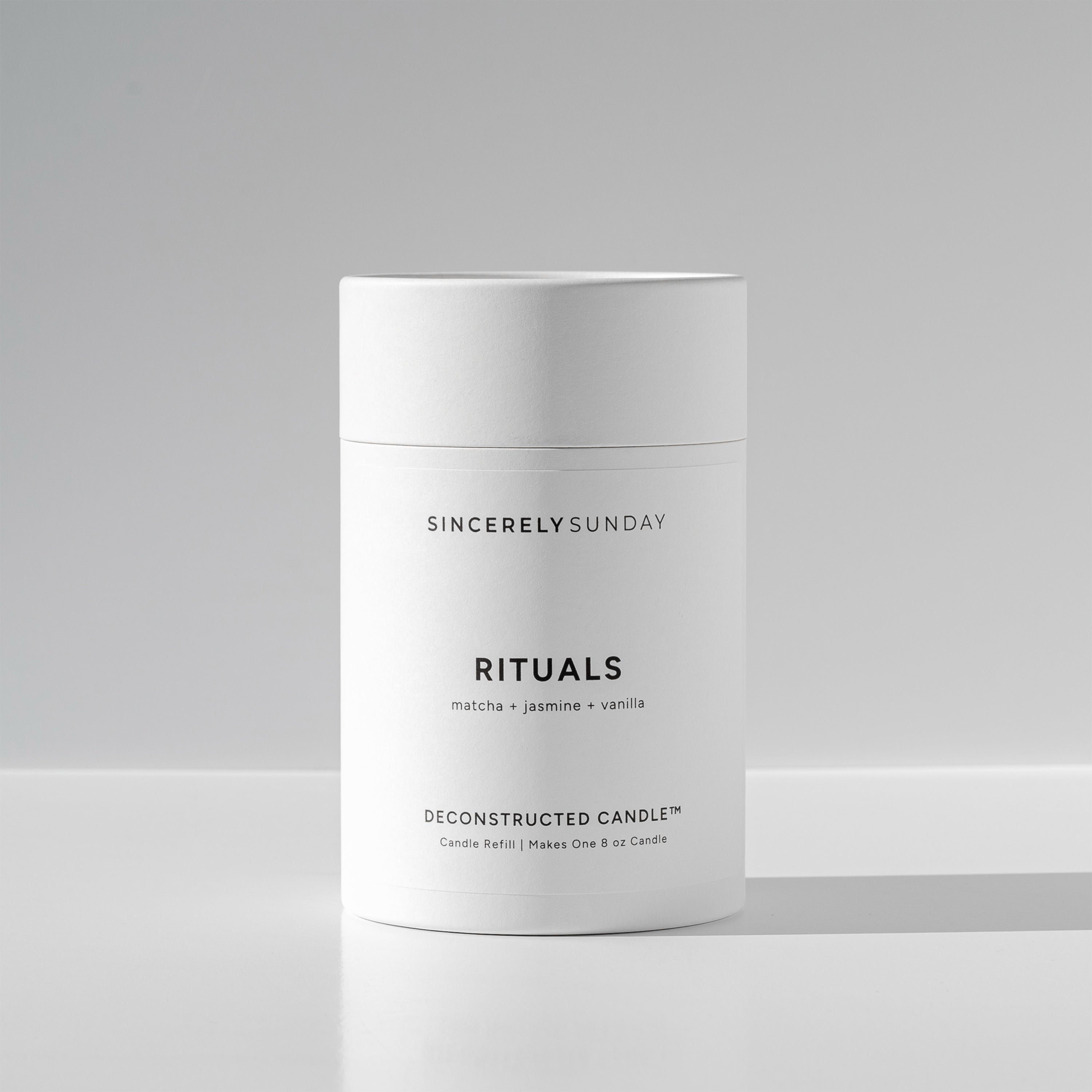 White cylindrical paper tube labeled 'Rituals' by Sincerely Sunday on a white background