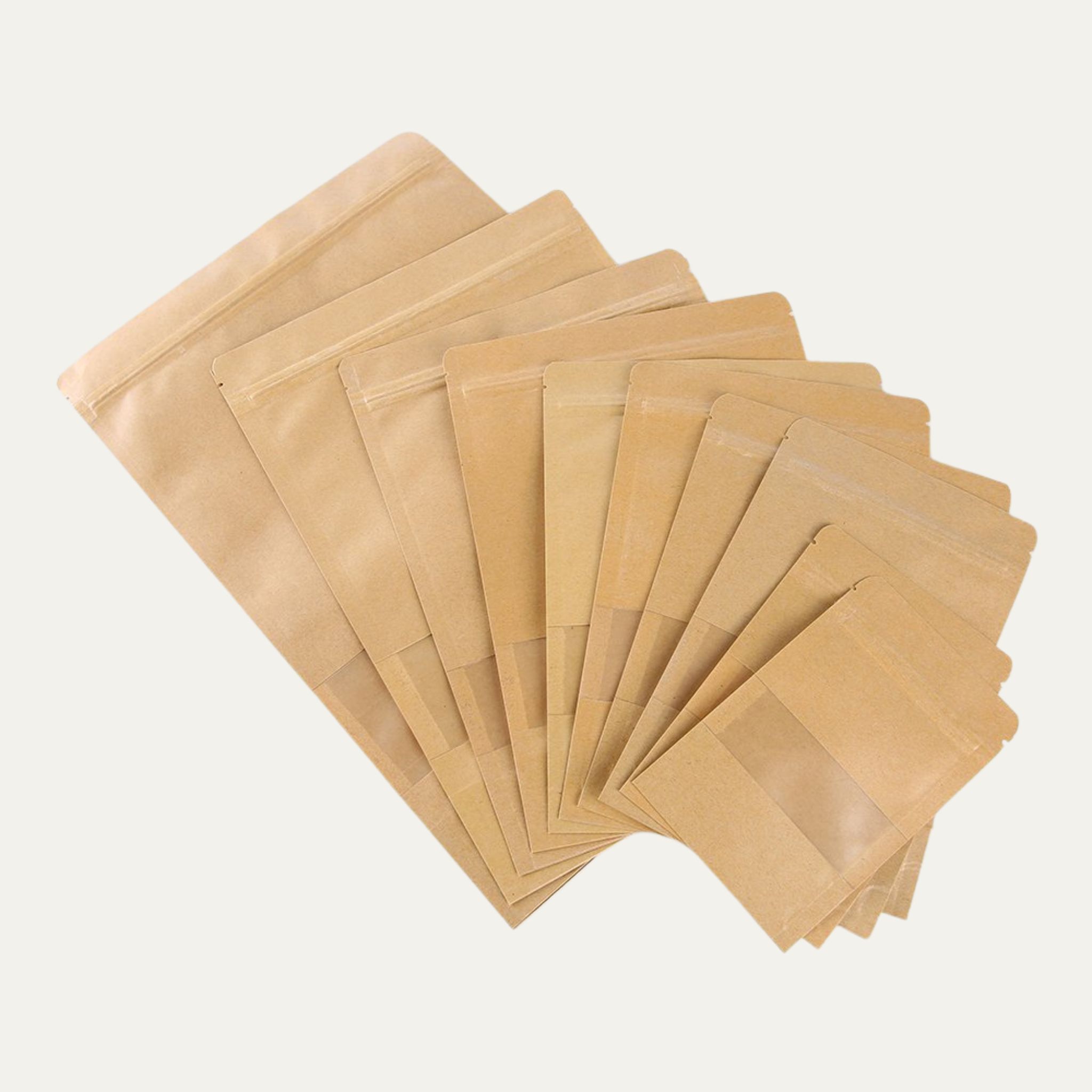 Stack of brown kraft bags fanned out on a light gray background.
