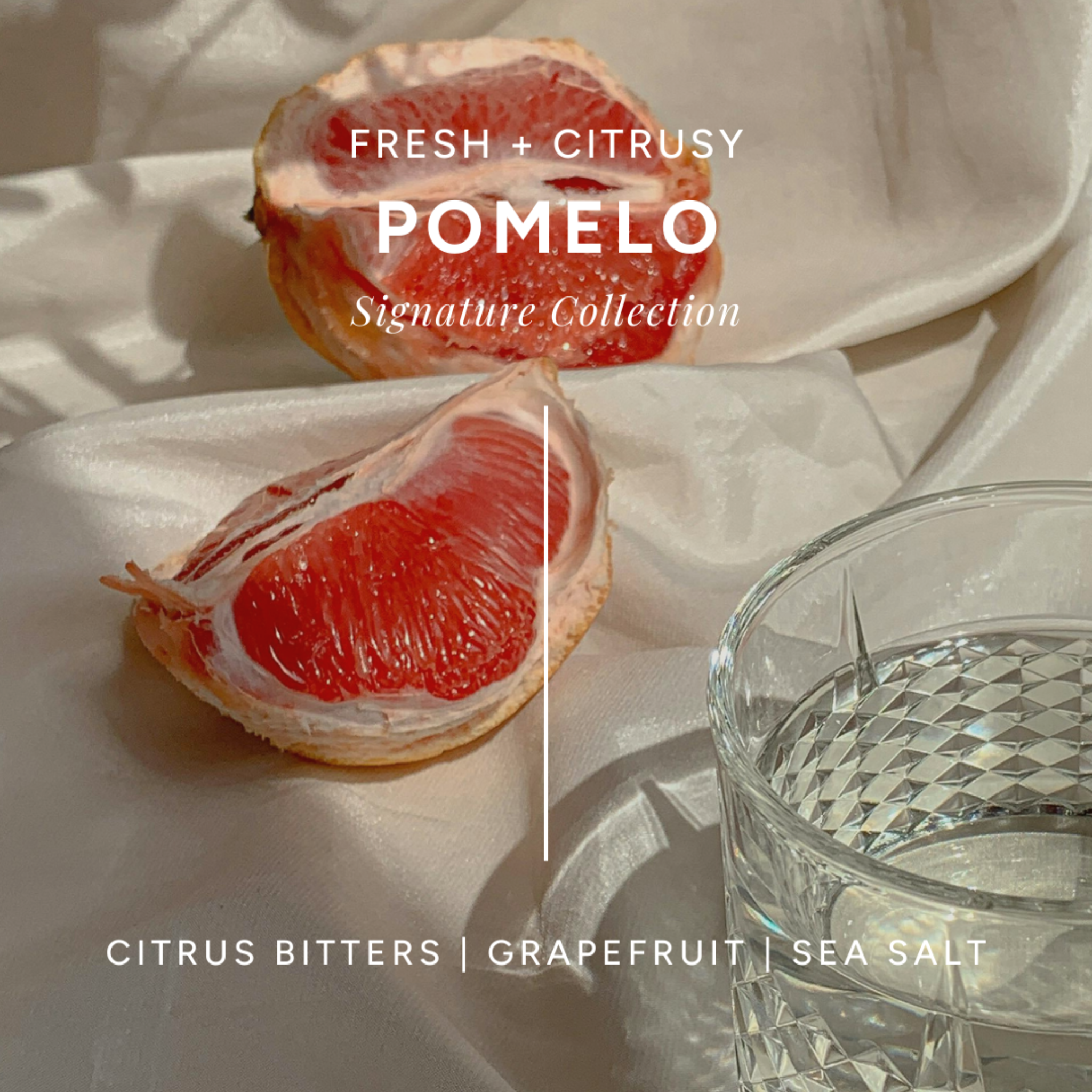 Infographic of 'Pomelo' scent with freshly sliced pomelo and a glass of water on blush satin sheets. has notes of citrus bitters, grapefruit, and sea salt.