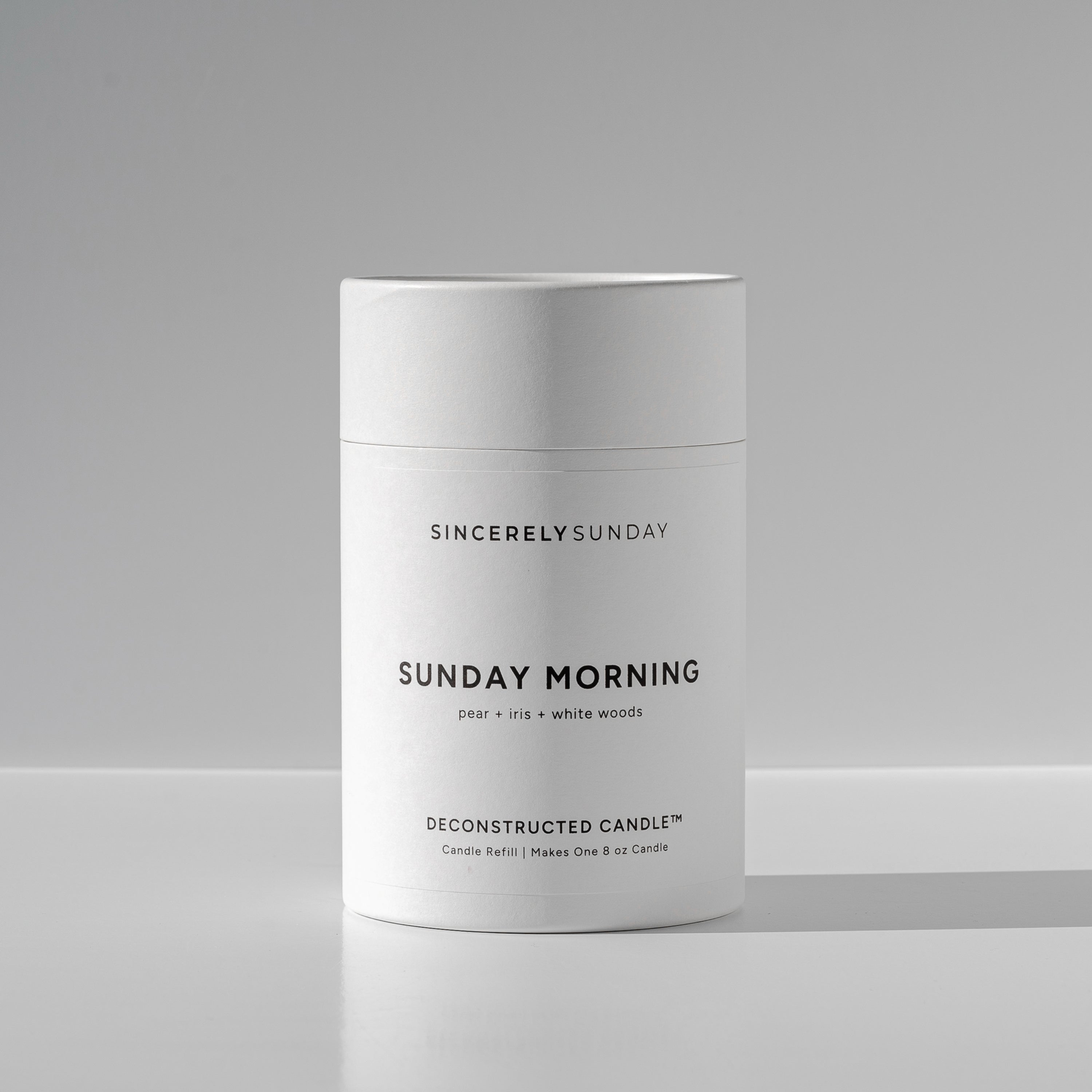 White cylindrical paper tube labeled 'Sunday Morning' by Sincerely Sunday on a white background